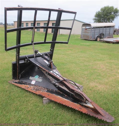 wheel saw skid steer|used skid steer tree saw.